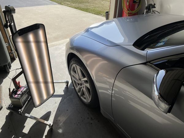 PDR light positioned to read the Lexus IS fender