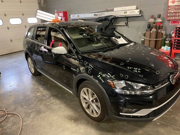 VW Golf Alltrack in the shop for hail damage repair